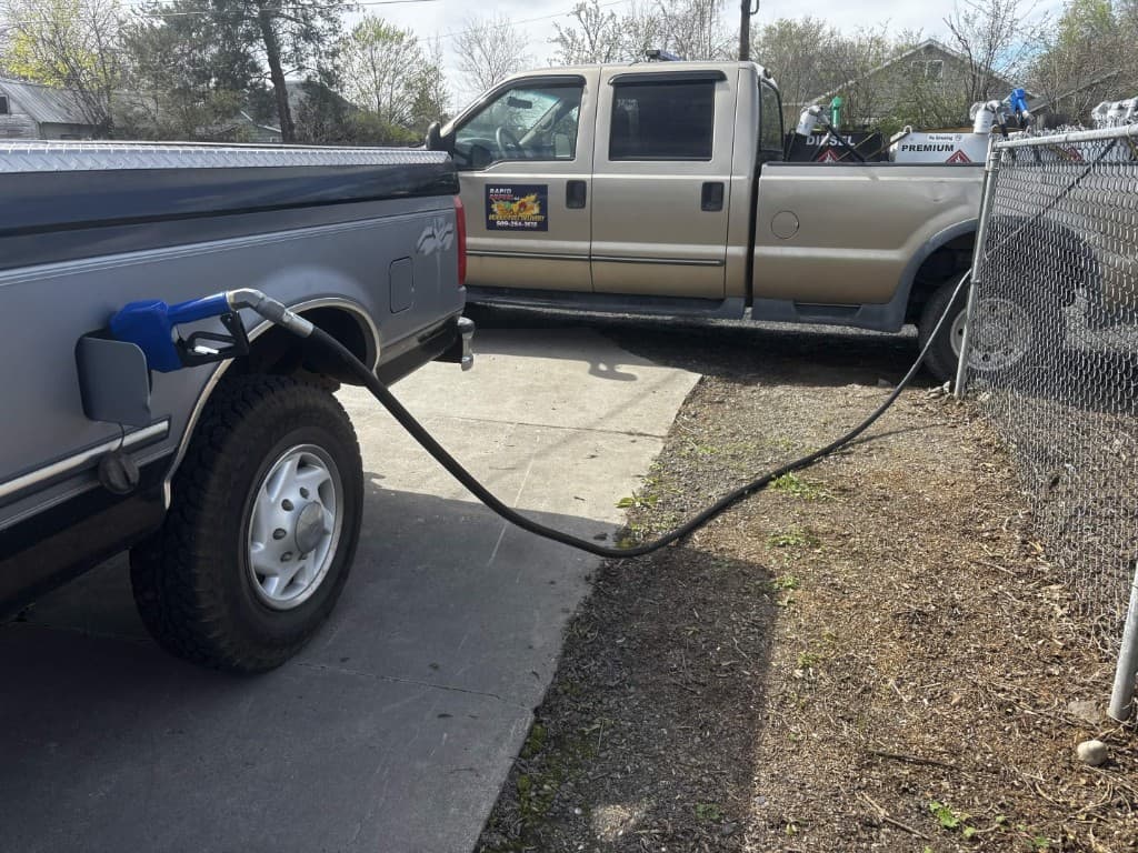 Mobile fuel delivery to a residential driveway